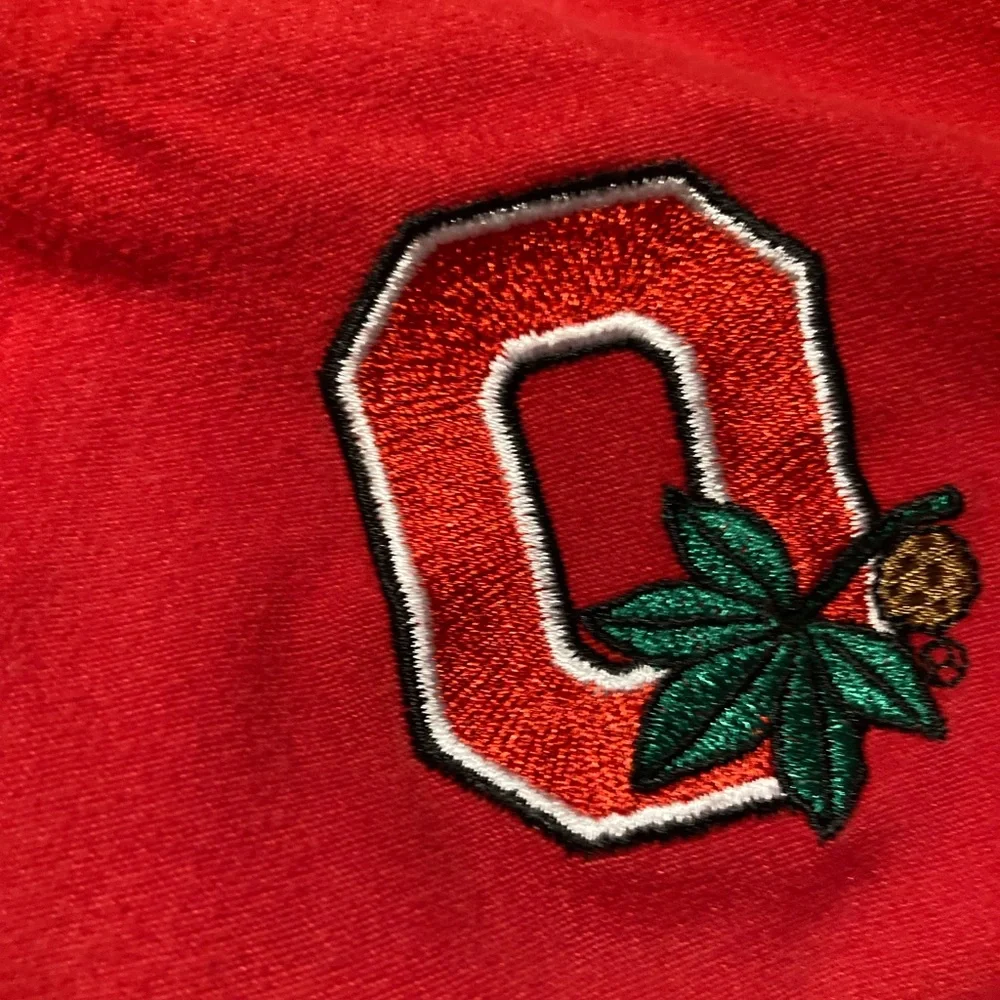 Red Ohio State Buckeyes scrub pants, size medium, small stain under pocket